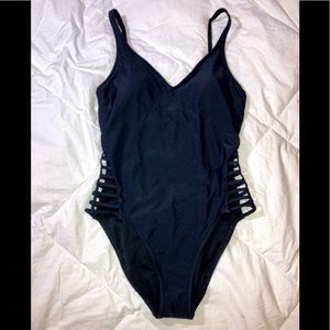 One price black bathing suit with cutouts